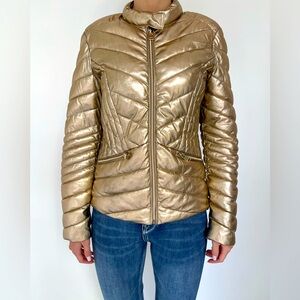 Jacket Warm cosmic golden faux leather, quilted to show the greatest body shape